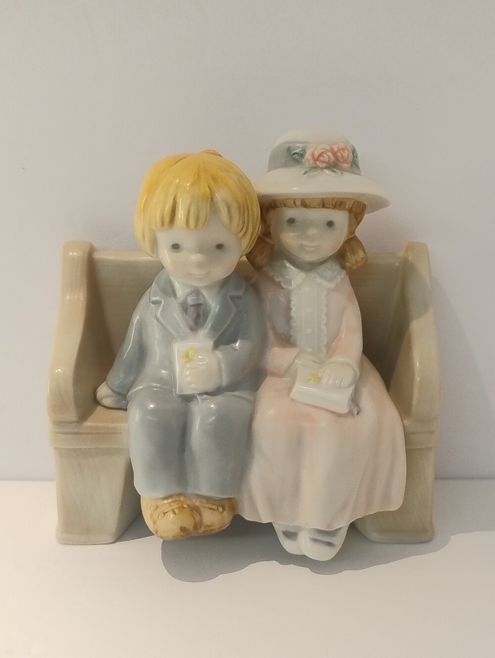 Kinka Sweet Religious Boy And Girl On Pew Seated Together Ceramic Figurine